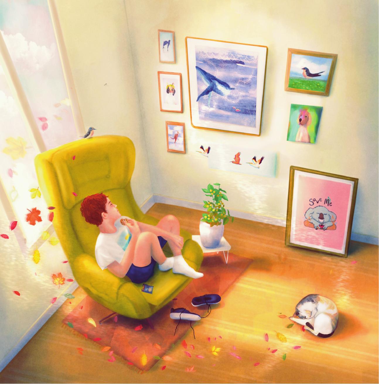 Boy daydreaming in yellow armchair with autumn leaves